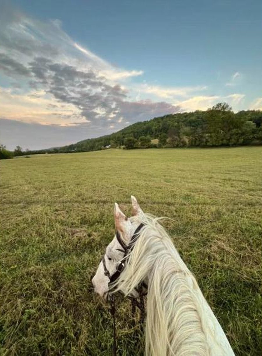 Riding Ryder, Summer's horse, on the family's small farm in East Tennessee
